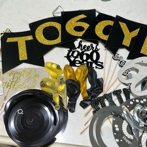 60 year old birthday decor.  Banners, cake toppers, balloons, candles, etc